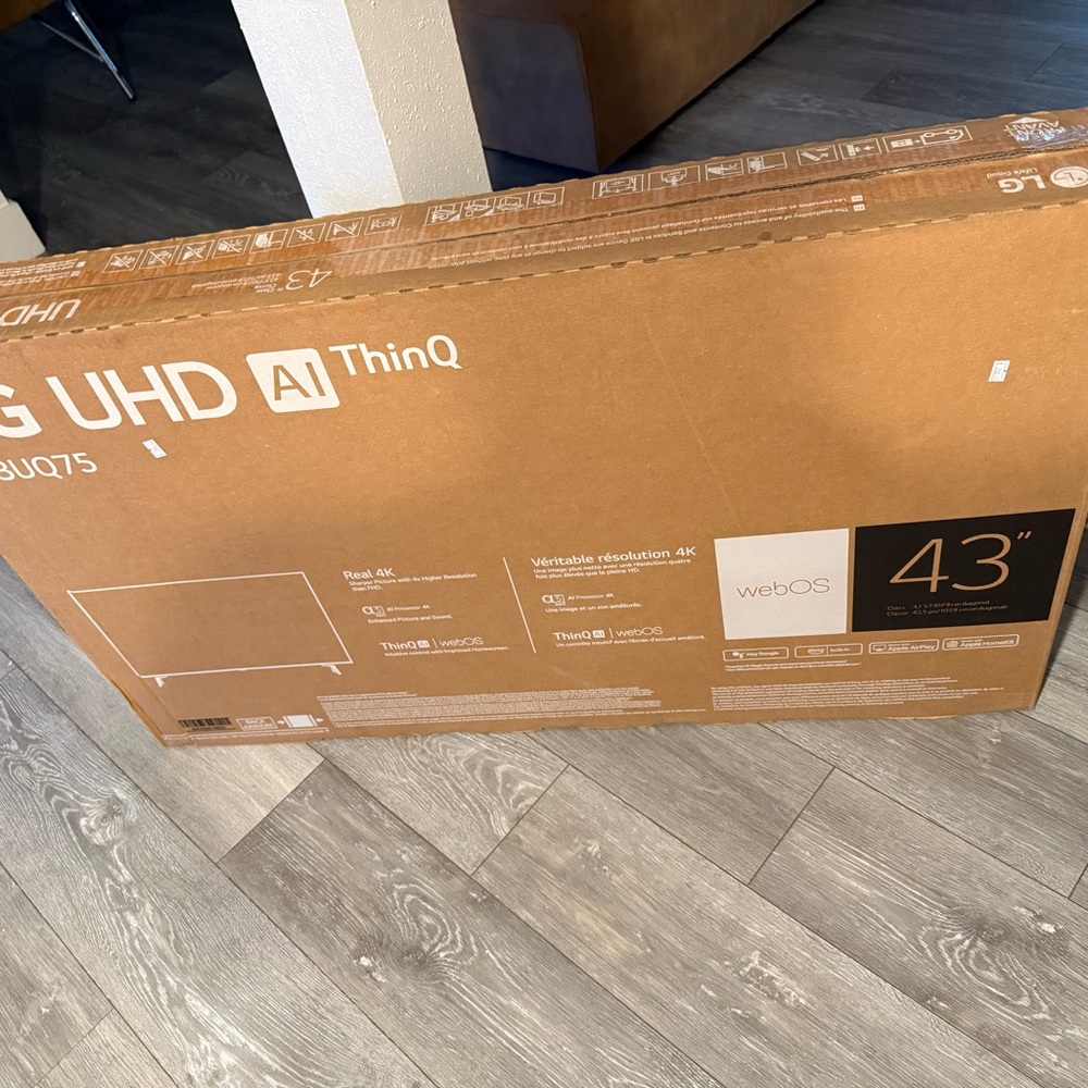LG 43" webOS Smart TV with Black and Brown Design